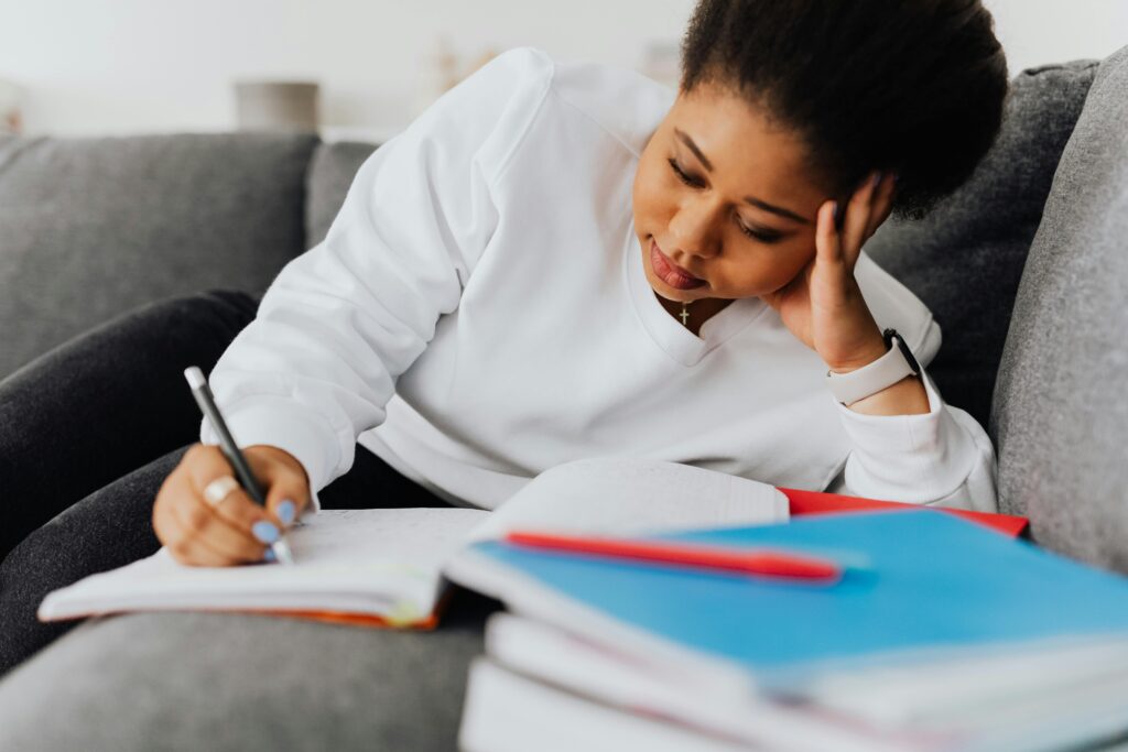 A woman doing her homework.